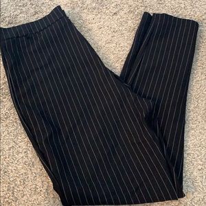 Black pants with white pin stripes